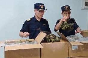 近日广州海关在跨境电商渠道查获一批夹藏出口的粽子重16吨广州海关所...